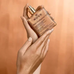 Nuxe Huile Prodigieuse Or -Teint Lisse Soldes Magasin nuxe huile prodigieuse or huile seche multifonctionnelle aux paillettes visage corps et cheveux 1